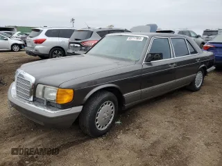 1987 Mercedes-Benz 560 with VIN WDBCA39D7HA322057, listed as a Copart auction lot 83717904 with 246,060 mi miles and Clean Title. Bid and sale history available at DreamBid. Image 1.