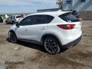 2016 Mazda CX-5 Grand Touring with VIN JM3KE2DY0G0888854, listed as a Copart auction lot 68379754 with 73,096 mi miles and Salvage Title. Bid and sale history available at carsss.com. Image 2.