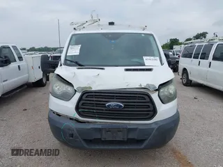 2016 Ford Transit Cargo with VIN 1FTYE1ZM6GKA95971, listed as a IAAI auction lot 42412181 with 243,171 mi miles and . Bid and sale history available at DreamBid. Image 12.