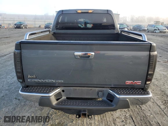 2012 GMC Canyon SLE1 with VIN 1GTH5MFE2C8132732, listed as a Copart auction lot 81045204 with 164,480 mi miles and Salvage Title. Bid and sale history available at carsss.com. Image 6.