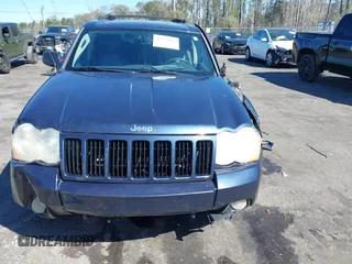 2009 Jeep Grand Cherokee Laredo with VIN 1J8HR48P19C540785, listed as a IAAI auction lot 41729851 with 205,504 mi miles. Bid and sale history available at carsss.com. Image 12.
