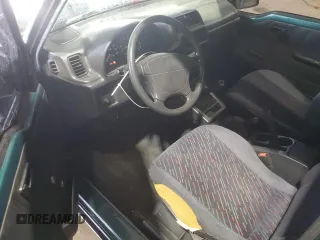 1996 Chevrolet Tracker z VIN 2CNBJ1869T6903842, wystawiony jako Copart lot #87734315 z przebiegiem 120 835 mil mil oraz Szkoda całkowita • Salvage title. Historia ofert i sprzedaży dostępna na DreamBid. Obrazek 8.