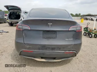 2024 Tesla Model Y Long Range with VIN 7SAYGDEE2RA287446, listed as a Copart auction lot 57640895 with 27,932 mi miles and Salvage title. Bid and sale history available at DreamBid. Image 6.