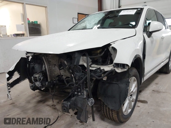 2014 Volkswagen Touareg Sport with VIN WVGEF9BP6ED005007, listed as a IAAI auction lot 41757033 with Not Provided miles and . Bid and sale history available at DreamBid. Image 6.