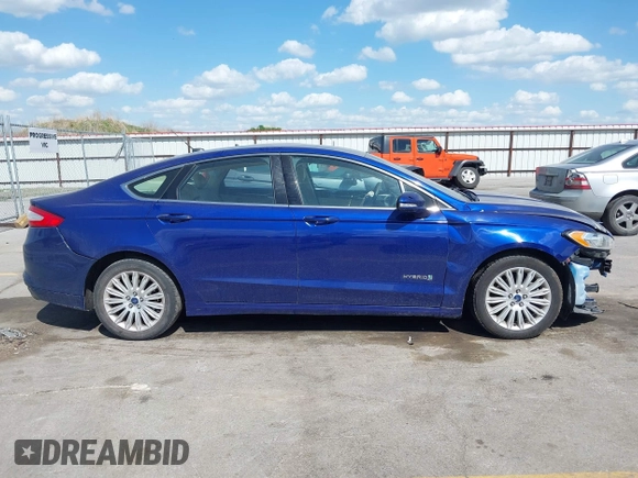 2014 Ford Fusion SE Hybrid с VIN 3FA6P0LU9ER129016, выставлен на аукционе IAAI как лот 42269103 с пробегом 170 001 миль миль и . История ставок и продаж доступна на DreamBid. Изображение 13.