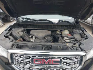 2017 GMC Acadia Denali with VIN 1GKKNPLSXHZ323869, listed as a IAAI auction lot 41600828 with 131,676 mi miles. Bid and sale history available at carsss.com. Image 10.