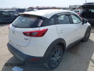 2018 Mazda CX-3 Touring z VIN JM1DKDC75J0326180, wystawiony jako IAAI lot #41787541 z przebiegiem 96 584 mil mil oraz . Historia ofert i sprzedaży dostępna na DreamBid. Obrazek 4.