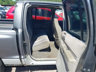 2001 Dodge Dakota Sport z VIN 1B7HL2ANX1S297770, wystawiony jako IAAI lot #42309715 z przebiegiem 279 458 mil mil oraz . Historia ofert i sprzedaży dostępna na DreamBid. Obrazek 8.