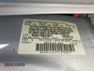 2009 Nissan Versa S with VIN 3N1BC11E39L376873, listed as a Copart auction lot 60299465 with 134,769 mi miles and Salvage title. Bid and sale history available at DreamBid. Image 12.