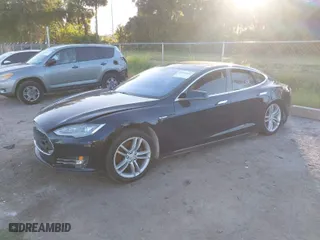 2013 Tesla Model S with VIN 5YJSA1DN9DFP06165, listed as a IAAI auction lot 40920844 with 181,342 mi miles. Bid and sale history available at carsss.com. Image 2.