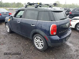 2015 MINI Countryman z VIN WMWZB3C59FWR43890, wystawiony jako IAAI lot #42372407 z przebiegiem 131 884 mil mil oraz . Historia ofert i sprzedaży dostępna na DreamBid. Obrazek 3.