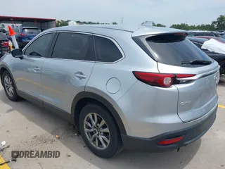 2018 Mazda CX-9 Touring with VIN JM3TCACY5J0219346, listed as a IAAI auction lot 42269310 with 93,989 mi miles and . Bid and sale history available at DreamBid. Image 3.