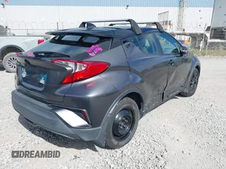 2021 Toyota C-HR LE with VIN JTNKHMBX1M1120212, listed as a IAAI auction lot 41975849 with 62,228 mi miles. Bid and sale history available at carsss.com. Image 4.