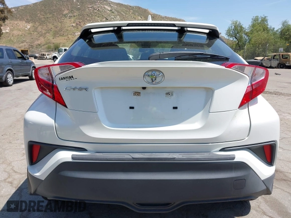 2020 Toyota C-HR LE with VIN JTNKHMBX3L1074882, listed as a IAAI auction lot 42064899 with 44,897 mi miles and . Bid and sale history available at DreamBid. Image 16.