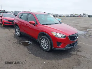 2015 Mazda CX-5 Sport z VIN JM3KE2BE9F0452625, wystawiony jako IAAI lot #42114867 z przebiegiem 167 849 mil mil oraz . Historia ofert i sprzedaży dostępna na DreamBid. Obrazek 1.