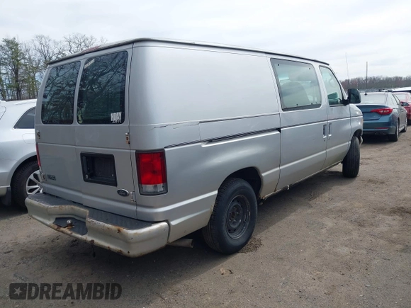 2001 Ford Econoline Cargo with VIN 1FTRE14281HA44065, listed as a IAAI auction lot 41828491 with 116,086 mi miles. Bid and sale history available at carsss.com. Image 4.