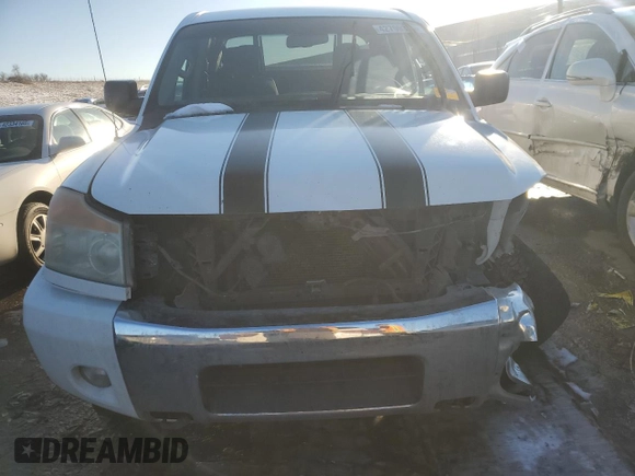 2012 Nissan Titan SV with VIN 1N6AA0EC1CN326088, listed as a Copart auction lot 42799335 with 163,218 mi miles and Salvage Title. Bid and sale history available at carsss.com. Image 5.