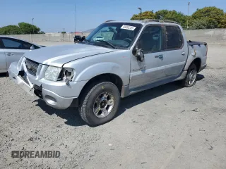 2001 Ford Explorer Sport Trac with VIN 1FMZU67EX1UB90668, listed as a Copart auction lot 60085255 with 184,002 mi miles and Salvage title. Bid and sale history available at DreamBid. Image 1.