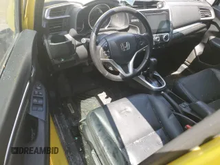 2015 Honda Fit EX-L z VIN 3HGGK5H8XFM767023, wystawiony jako Copart lot #62157155 z przebiegiem Nie podano mil oraz Szkoda całkowita • Salvage title. Historia ofert i sprzedaży dostępna na DreamBid. Obrazek 8.