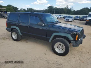 1997 Jeep Cherokee SE with VIN 1J4FJ28S6VL563756, listed as a Copart auction lot 74795074 with 196,118 mi miles and Salvage Title. Bid and sale history available at carsss.com. Image 4.