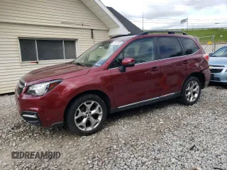 2017 Subaru Forester Touring z VIN JF2SJAWC2HH519059, wystawiony jako Copart lot #57477355 z przebiegiem 84 745 mil mil oraz Szkody całkowita. Historia ofert i sprzedaży dostępna na DreamBid. Obrazek 1.