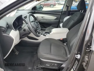 2023 Hyundai Tucson SEL with VIN 5NMJBCAE3PH261921, listed as a Copart auction lot 52076995 with 19,558 mi miles and Salvage Title. Bid and sale history available at DreamBid. Image 7.