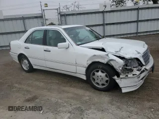 2000 Mercedes-Benz C 230 Kompressor with VIN WDBHA24G1YF946926, listed as a Copart auction lot 70884494 with 115,791 mi miles and Salvage Title. Bid and sale history available at carsss.com. Image 4.