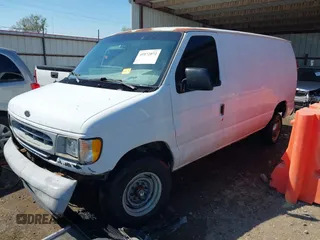 2001 Ford Econoline Cargo with VIN 1FTNE24L11HA65062, listed as a IAAI auction lot 41872072 with 456,684 mi miles and . Bid and sale history available at DreamBid. Image 2.