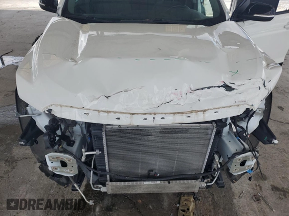 2021 GMC Acadia AT4 z VIN 1GKKNLLS6MZ121632, wystawiony jako Copart lot #56855385 z przebiegiem 48 516 mil mil oraz Szkoda całkowita • Salvage title. Historia ofert i sprzedaży dostępna na DreamBid. Obrazek 12.