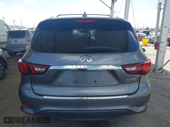 2019 Infiniti QX60 Pure z VIN 5N1DL0MN3KC565998, wystawiony jako IAAI lot #41911130 z przebiegiem 79 463 mil mil oraz . Historia ofert i sprzedaży dostępna na DreamBid. Obrazek 16.