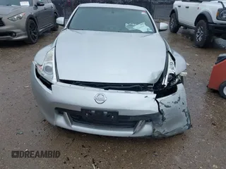 2010 Nissan 370Z Touring z VIN JN1AZ4EH9AM503264, wystawiony jako IAAI lot #42180901 z przebiegiem Nie podano mil oraz . Historia ofert i sprzedaży dostępna na DreamBid. Obrazek 12.