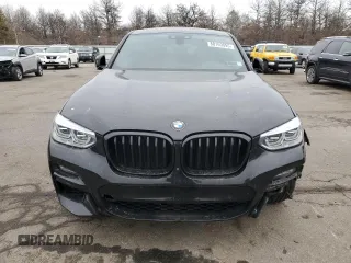 2021 BMW X4 M40i z VIN 5UX2V5C08M9H82988, wystawiony jako Copart lot #88169095 z przebiegiem 61 826 mil mil oraz Szkoda całkowita • Salvage title. Historia ofert i sprzedaży dostępna na DreamBid. Obrazek 5.