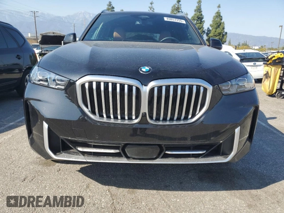 2025 BMW X5 sDrive40i with VIN 5UX13EU05S9W82678, listed as a Copart auction lot 49857255 with 9,901 mi miles and Salvage Title. Bid and sale history available at carsss.com. Image 5.