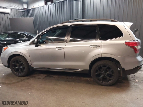 2015 Subaru Forester 2.5i Touring with VIN JF2SJAUC8FH468456, listed as a IAAI auction lot 41132284 with 188,408 mi miles. Bid and sale history available at carsss.com. Image 15.