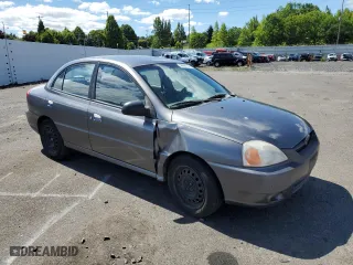 2004 Kia Rio with VIN KNADC125946330310, listed as a Copart auction lot 69411894 with 198,704 mi miles and Salvage Title. Bid and sale history available at carsss.com. Image 4.