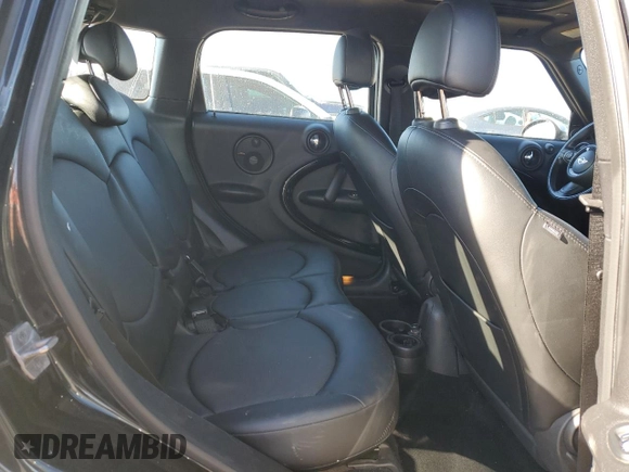 2016 MINI Countryman S with VIN WMWZC5C59GWU21416, listed as a Copart auction lot 57477455 with 119,868 mi miles and Salvage title. Bid and sale history available at DreamBid. Image 11.