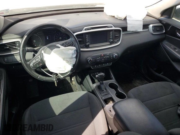 2017 Kia Sorento LX z VIN 5XYPG4A34HG220340, wystawiony jako Copart lot #57467775 z przebiegiem 144 612 mil mil oraz Szkoda całkowita • Salvage title. Historia ofert i sprzedaży dostępna na DreamBid. Obrazek 8.
