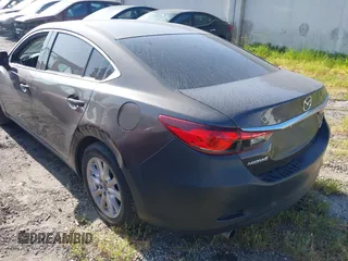 2016 Mazda 6 i Sport with VIN JM1GJ1U57G1425243, listed as a IAAI auction lot 41901771 with 135,155 mi miles and . Bid and sale history available at DreamBid. Image 3.