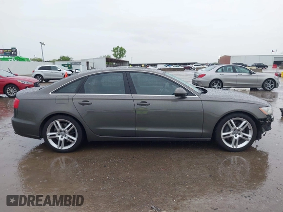 2014 Audi A6 Premium Plus z VIN WAUGFAFC3EN087176, wystawiony jako IAAI lot #42117602 z przebiegiem 53 571 mil mil oraz . Historia ofert i sprzedaży dostępna na DreamBid. Obrazek 14.