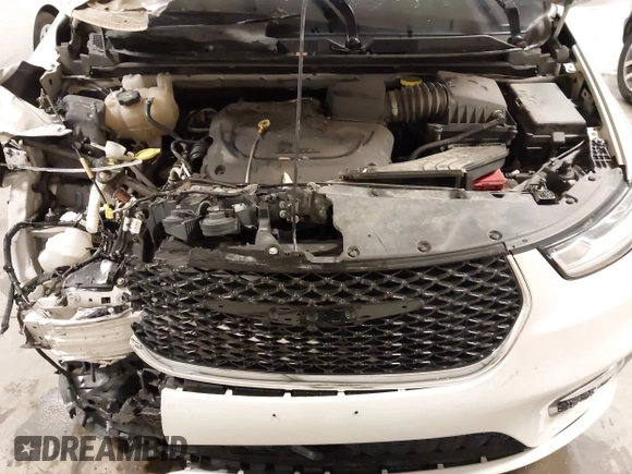 2021 Chrysler Pacifica Touring L with VIN 2C4RC1BG7MR531772, listed as a IAAI auction lot 41834392 with 156,123 mi miles and . Bid and sale history available at DreamBid. Image 10.