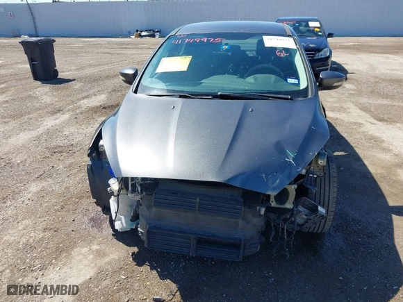2017 Ford Focus SE with VIN 1FADP3F23HL202077, listed as a IAAI auction lot 41749975 with 67,736 mi miles. Bid and sale history available at carsss.com. Image 6.