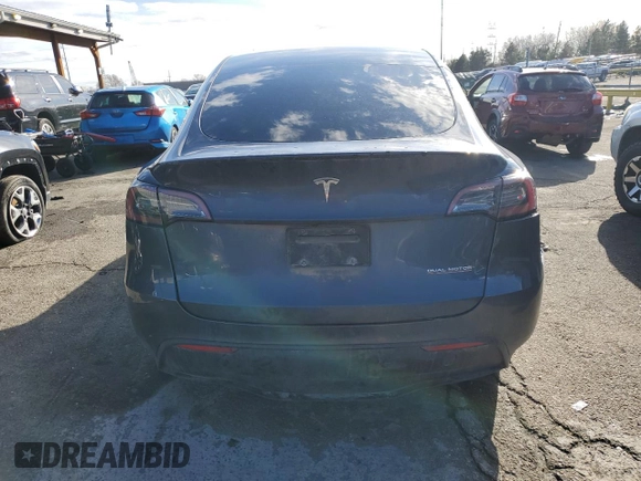 2022 Tesla Model Y Performance with VIN 7SAYGDEF0NF452111, listed as a Copart auction lot 47595975 with 33,514 mi miles and Salvage Title. Bid and sale history available at DreamBid. Image 6.