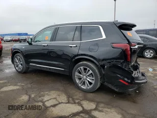 2022 Cadillac XT6 Premium Luxury z VIN 1GYKPDRSXNZ161744, wystawiony jako Copart lot #54901995 z przebiegiem 24 994 mil mil oraz Szkoda całkowita • Salvage title. Historia ofert i sprzedaży dostępna na DreamBid. Obrazek 2.