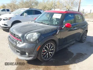 2016 MINI Countryman John Cooper Works with VIN WMWXD1C5XGWT97513, listed as a IAAI auction lot 41647602 with 160,179 mi miles and . Bid and sale history available at DreamBid. Image 2.