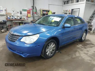 2007 Chrysler Sebring Touring z VIN 1C3LC56K57N508248, wystawiony jako IAAI lot #42305748 z przebiegiem 174 621 mil mil oraz . Historia ofert i sprzedaży dostępna na DreamBid. Obrazek 17.