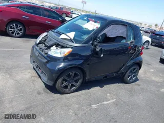2015 Smart fortwo Passion with VIN WMEEJ3BA0FK812651, listed as a IAAI auction lot 42063112 with 25,270 mi miles. Bid and sale history available at carsss.com. Image 13.