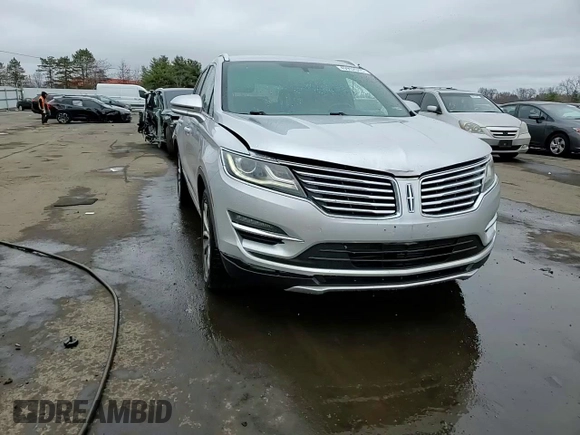 2015 Lincoln MKC z VIN 5LMCJ2A94FUJ10689, wystawiony jako Copart lot #49952045 z przebiegiem 128 040 mil mil oraz Szkoda całkowita • Salvage title. Historia ofert i sprzedaży dostępna na DreamBid. Obrazek 13.