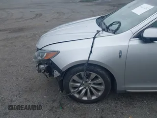 2013 Lincoln MKS с VIN 1LNHL9DK3DG604712, выставлен на аукционе IAAI как лот 42351237 с пробегом 144 927 миль миль и . История ставок и продаж доступна на DreamBid. Изображение 16.