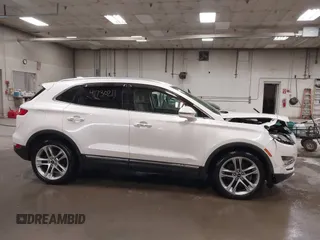 2019 Lincoln MKC Reserve with VIN 5LMCJ3D9XKUL17812, listed as a IAAI auction lot 41730211 with 56,716 mi miles and . Bid and sale history available at DreamBid. Image 14.
