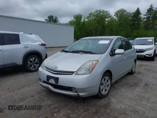 2006 Toyota Prius z VIN JTDKB20U967074471, wystawiony jako IAAI lot #42332013 z przebiegiem 303 162 mil mil oraz . Historia ofert i sprzedaży dostępna na DreamBid. Obrazek 2.